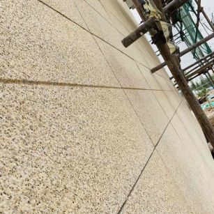 广元 黄金麻花岗岩荔枝面外墙干挂石材效果示例