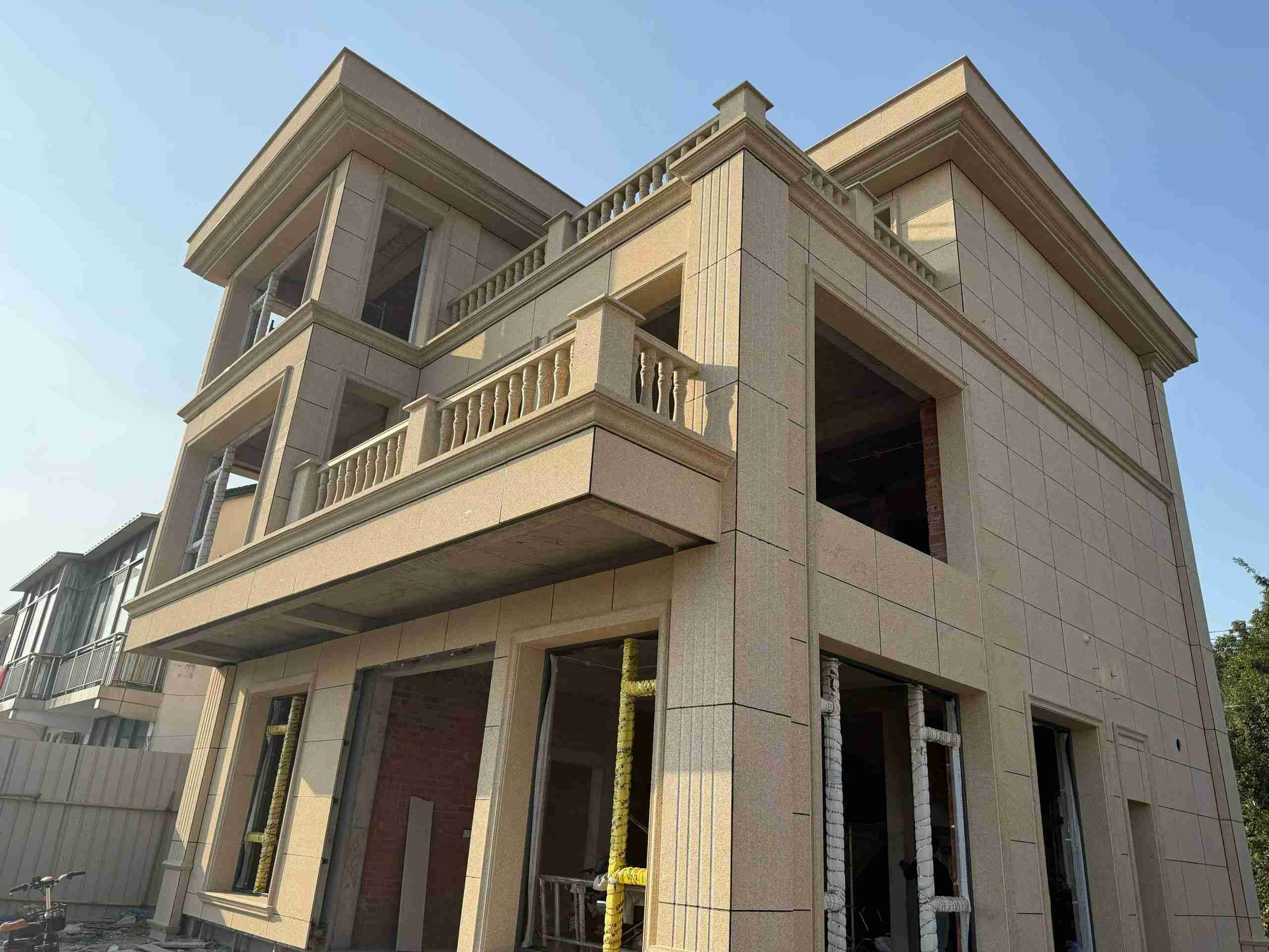 广元 黄金麻花岗岩石材荔枝面外墙干挂效果展示